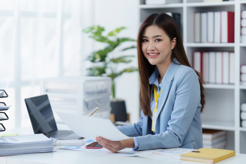 Accountant woman working on laptop and do document, tax, exchange, research, accounting and Financial advisor concept.